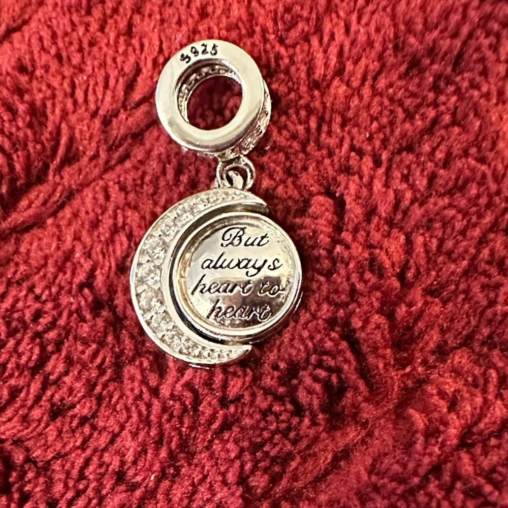 S 925 Charm . Like New. “Not Always Eye to Eye, But Always Heart to Heart”